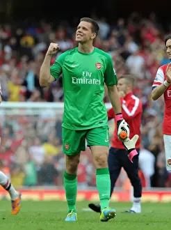 Celebration Time: Wojciech Szczesny's Thrilling Save and Arsenal's Victory over Tottenham Hotspur (2013-14)