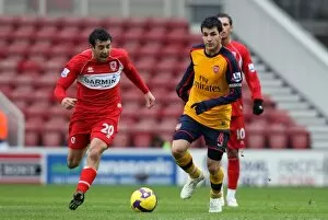 Images Dated 13th December 2008: Ces Fabregas (Arsenal) Julio Arca (Middlesbrough)