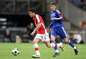 Ajax V Arsenal Prints: Cesc Faberags (Arsenal) Kls Jan Huntelaar (Ajax)