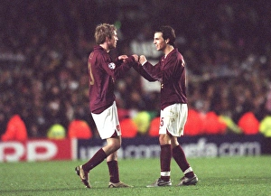 Arsenal v Juventus 2005-6 Gallery: Cesc Fabregas and Alex Hleb (Arsenal) celebrates at the end of the match
