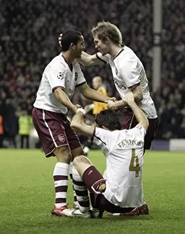Liverpool v Arsenal - Champions League 2007-08 Collection: Cesc Fabregas and Alex Hleb celebrate Arsenals 2nd goal with the creator Theo Walcott