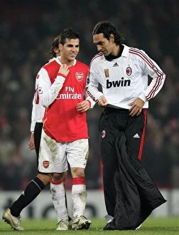 Images Dated 21st February 2008: Cesc Fabregas (Arsenal) and Alessandro Nesta (AC Milan) swap shirts after the match