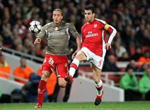 Images Dated 24th November 2009: Cesc Fabregas (Arsenal) Axel Witsel (Liege)