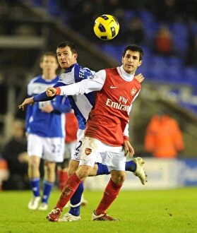 Images Dated 1st January 2011: Cesc Fabregas (Arsenal) Barry Ferguson (Birmingham). Birmingham City 0: 3 Arsenal