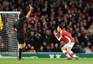 Cesc Fabregas (Arsenal) is booked by referee Massimo Busacca. Arsenal 2: 2 Barcelona