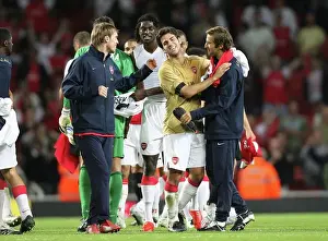 Cesc Fabregas (Arsenal) celebrates after the match with Alex Hleb and Mathieu Flamini