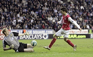 Wigan Athletic v Arsenal 2007-08 Collection: Cesc Fabregas (Arsenal) Chris Kirkland (Wigan)