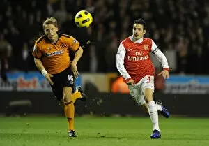 Cesc Fabregas (Arsenal) Christophe Berra (Wolves). Wolverhampton Wanderers 0: 2 Arsenal