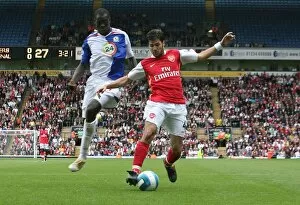 Images Dated 19th August 2007: Cesc Fabregas (Arsenal) Christopher Samba (Blackburn Rovers)