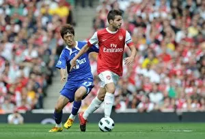 Images Dated 11th September 2010: Cesc Fabregas (Arsenal) Chung-Yong Lee (Bolton). Arsenal 4: 1 Blackburn Rovers