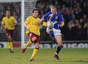 Ipswich Town v Arsenal Carling Cup 2010-11 Collection: Cesc Fabregas (Arsenal) Colin Healy (Ipswich). Ipswich Town 1: 0 Arsenal