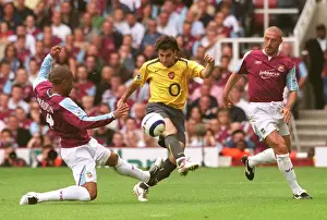Cesc Fabregas (Arsenal) Danny Gabbidon and Tomas Repka (West Ham United)