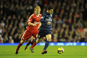 Liverpool v Arsenal 2009-10 Gallery: Cesc Fabregas (Arsenal) Dirk Kuyt (Liverpool). Liverpool 1: 2 Arsenal, Barclays Premier League