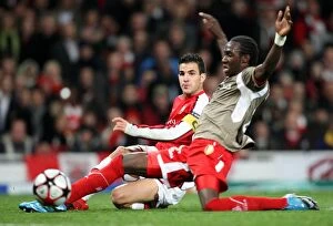 Images Dated 24th November 2009: Cesc Fabregas (Arsenal) Eliaquim Mangala (Liege)