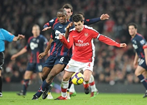 Cesc Fabregas (Arsenal) Fabrice Muamba (Bolton). Arsenal 4:2 Bolton Wanderers Cesc Fabregas (Arsenal) Fabrice Muamba (Bolton). Arsenal 4:2 Bolton Wanderers