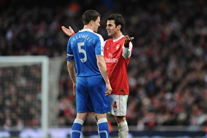 Cesc Fabregas (Arsenal) Gary Caldwell (Wigan). Arsenal 3:0 Wigan Athletic Cesc Fabregas (Arsenal) Gary Caldwell (Wigan). Arsenal 3:0 Wigan Athletic