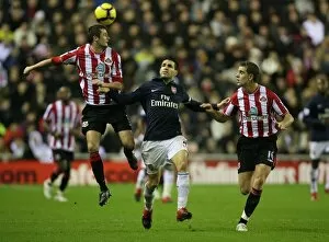 Images Dated 21st November 2009: Cesc Fabregas (Arsenal) George McCartney and Jordan Henderson (Sunderland)