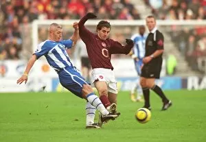 Images Dated 21st November 2005: Cesc Fabregas (Arsenal) Graham Kavanagh (Wigan)