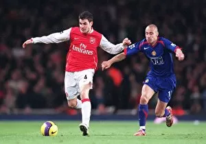 Images Dated 22nd January 2007: Cesc Fabregas (Arsenal) Henrik Larsson (Man Utd)