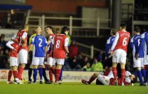 Cesc Fabregas (Arsenal) inured by a tackle by Birmingham defender Roger Johnson