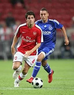 Cesc Fabregas (Arsenal) Ismail Assati (Ajax)