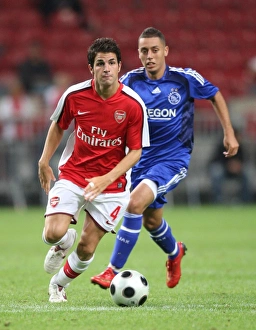 Ajax V Arsenal Prints: Cesc Fabregas (Arsenal) Ismail Assati (Ajax)