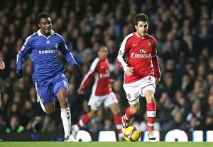 Images Dated 30th November 2008: Cesc Fabregas (Arsenal) John Obi Mikel (Chelsea)