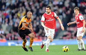 Images Dated 12th February 2011: Cesc Fabregas (Arsenal) Karl Henry (Wolves). Arsenal 2: 0 Wolverhampton Wanderers