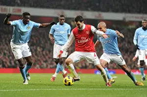 Arsenal V Manchester City 2010-11 Prints: Cesc Fabregas (Arsenal) Kolo Toure and Nigel De Jong (Man City). Arsenal 0