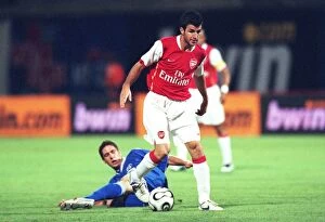 Images Dated 10th August 2006: Cesc Fabregas (Arsenal) Marijan Buljat (Dinamo Zagreb)