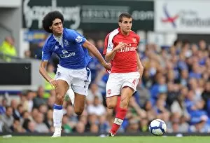 Images Dated 15th August 2009: Cesc Fabregas (Arsenal) Marouane Fellaini (Everton)