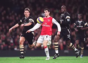 Cesc Fabregas (Arsenal) Matt Holland and Souleymane Diawara (Charlton)