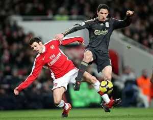 Arsenal v Liverpool 2009-10 Gallery: Cesc Fabregas (Arsenal) Maxi Rodriguez (Liverpool). Arsenal 1: 0 Liverpool