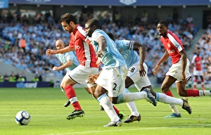 Images Dated 12th September 2009: Cesc Fabregas (Arsenal) Micah Richards (Man City)