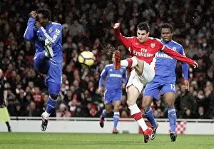 Arsenal v Chelsea 2009-10 Gallery: Cesc Fabregas (Arsenal) Michael Essien and Jon Obi Mikel (Chelsea). Arsenal 0: 3 Chelsea