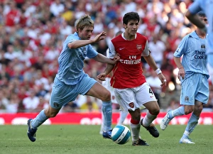 Arsenal v Manchester City 2007-08 Collection: Cesc Fabregas (Arsenal) Michael Johnson (Man City)