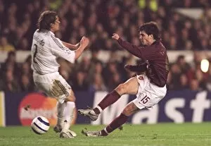Images Dated 9th March 2006: Cesc Fabregas (Arsenal) Michel Salgado (Real Madrid)