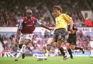 Images Dated 26th September 2005: Cesc Fabregas (Arsenal) Nigel Reo-Coker (West Ham). West Ham United 0: 0 Arsenal