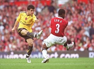 Manchester United v Arsenal 2006-7 Collection: Cesc Fabregas (Arsenal) Patrice Evra (Manchester United)
