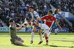 Images Dated 11th April 2009: Cesc Fabregas (Arsenal) Paul Scharner and Chris Kirkland (Wigan)