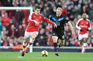 Images Dated 31st January 2010: Cesc Fabregas (Arsenal) Paul Scholes (Man United). Arsenal 1: 3 Manchester United