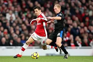 Images Dated 31st January 2010: Cesc Fabregas (Arsenal) Paul Scholes (Man Utd). Arsenal 1: 3 Manchester United