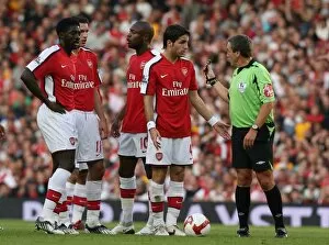 Arsenal v Hull City 2008-9 Collection: Cesc Fabregas (Arsenal) and referee Alan Wiley