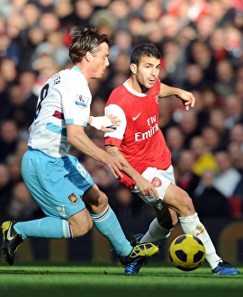 Arsenal V West Ham United 2010-11 Prints: Cesc Fabregas (Arsenal) Scott Parker (West Ham). Arsenal 1: 0 West Ham United