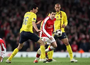 Cesc Fabregas (Arsenal) Sergio Busquets and Thierry Henry (Barcelona). Arsenal 2