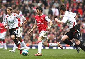 Arsenal v Liverpool 2007-08 Collection: Cesc Fabregas (Arsenal) Steve Finnan (Liverpool)