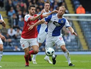Images Dated 28th August 2010: Cesc Fabregas (Arsenal) Vince Grella (Blackburn). Blackburn Rovers 1: 2 Arsenal