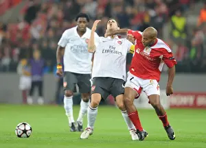 Standard Liege V Arsenal 2009-10 Prints: Cesc Fabregas (Arsenal) Wilfried Dalmat (Standard Liege)