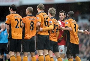 Images Dated 12th February 2011: Cesc Fabregas (Arsenal) in the Wolves wall. Arsenal 2: 0 Wolverhampton Wanderers