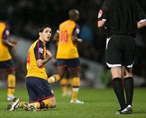 West Ham United v Arsenal 2008-09 Collection: Cesc Fabregas is booked by referee Phil Dowd